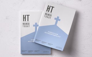 Two copies of an issue of Holiness Today stacked on each other.